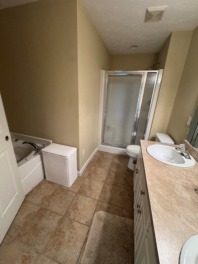 3802 Holland Ct, Phenix City, AL 36867 - full bath with double vanity, a shower stall, a bath, and a textured ceiling