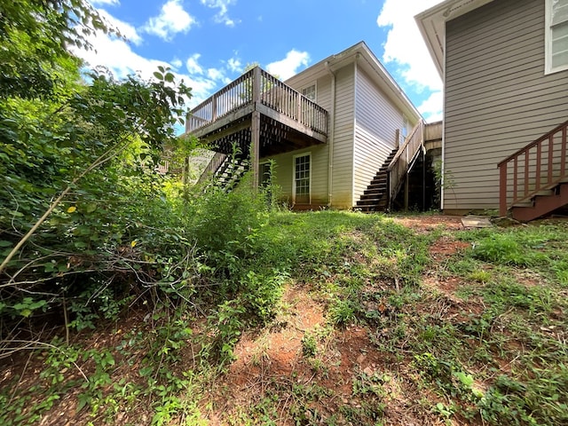 3802 Holland Ct, Phenix City, AL 36867 - rear view of property with stairway and a deck