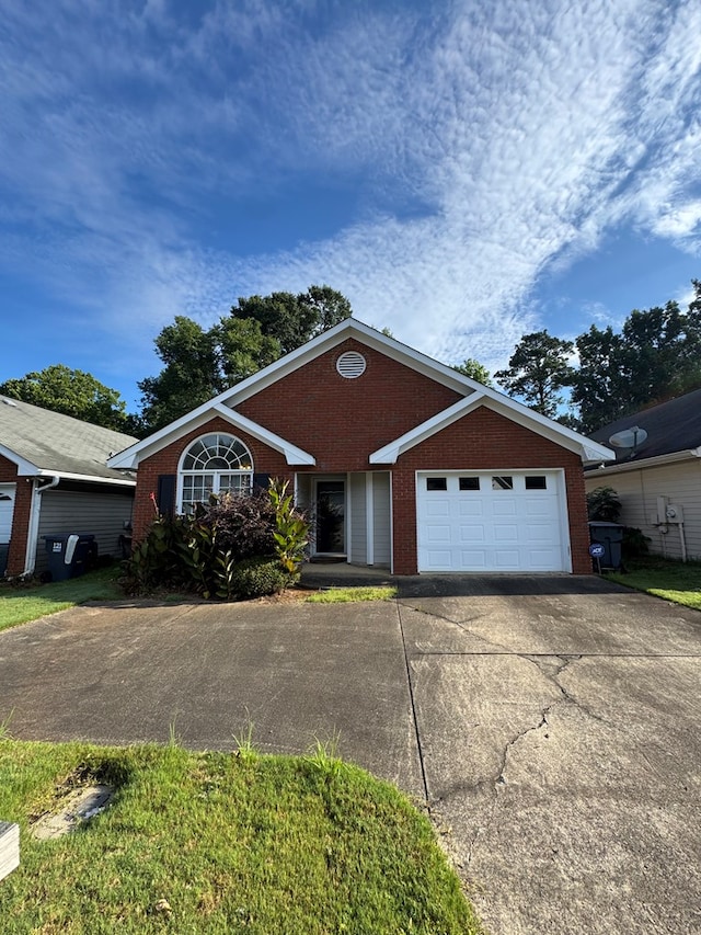 3802 Holland Ct, Phenix City, AL 36867 - ranch-style home featuring brick siding, concrete driveway, and a garage