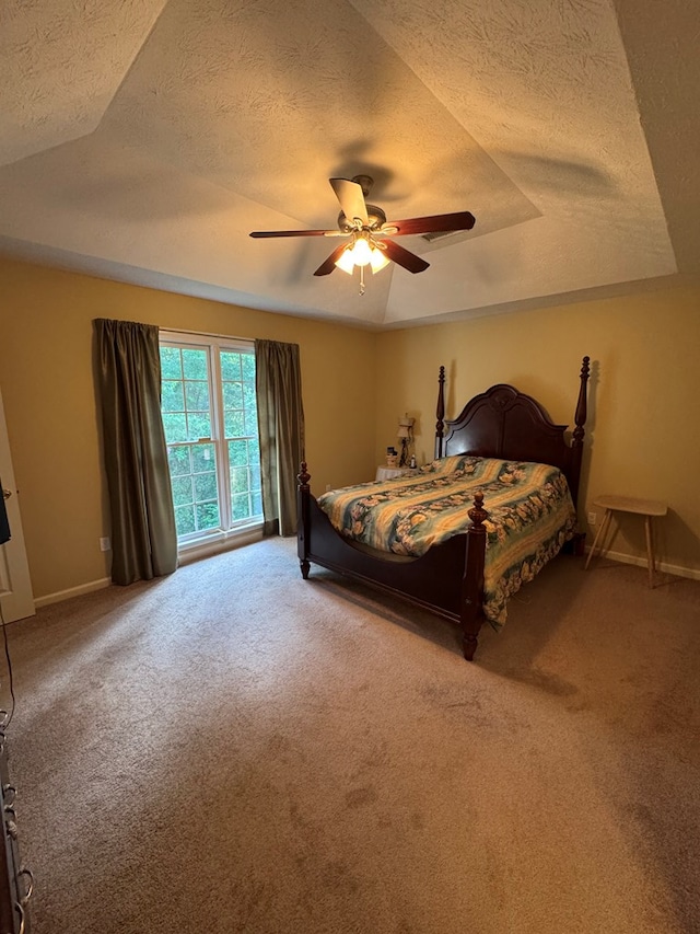 3802 Holland Ct, Phenix City, AL 36867 - carpeted bedroom featuring a textured ceiling and a ceiling fan