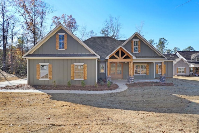3079 Lee Road 0318, Smiths Station, AL 36877 - view of front of house featuring french doors, roof with shingles, and board and batten siding