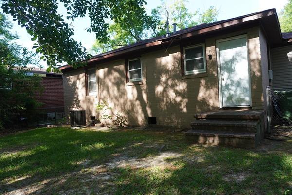 1006 34th Ave, Columbus, GA 31906 - back of house with a yard and central AC unit
