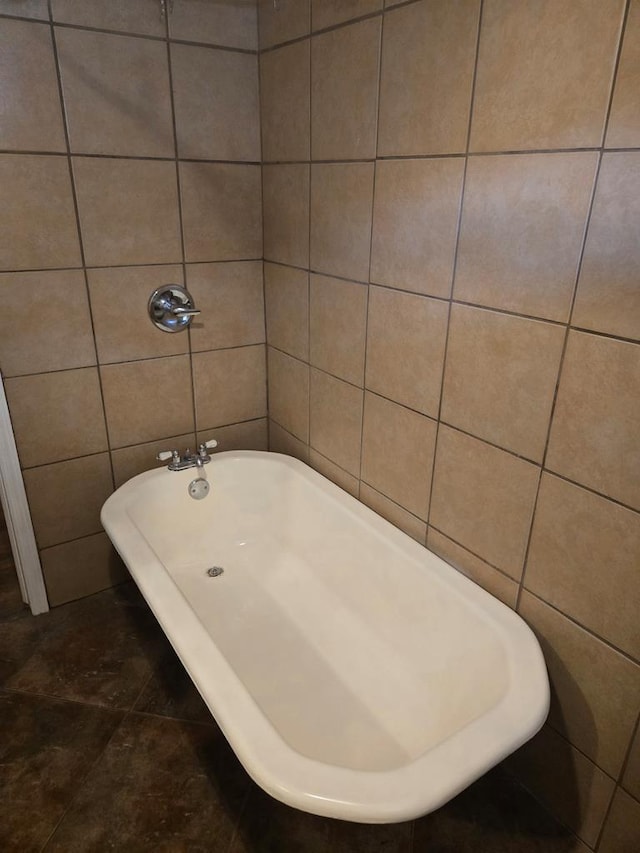 1704 18th St, Phenix City, AL 36867 - bathroom with tile walls and a bathtub