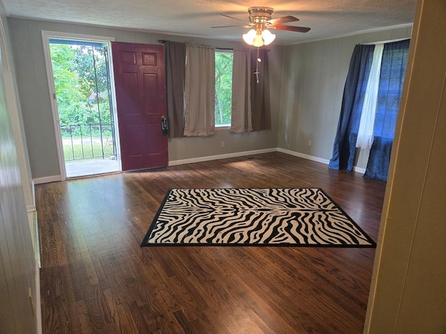1704 18th St, Phenix City, AL 36867 - entryway with dark wood-style floors, ceiling fan, healthy amount of natural light, and ornamental molding