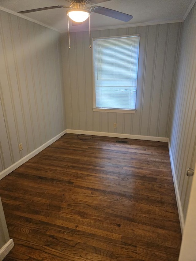 1704 18th St, Phenix City, AL 36867 - unfurnished room featuring a ceiling fan, dark wood finished floors, and ornamental molding