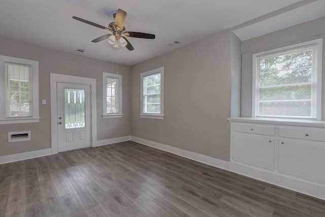 foyer with ceiling fan and hardwood / wood-style floors