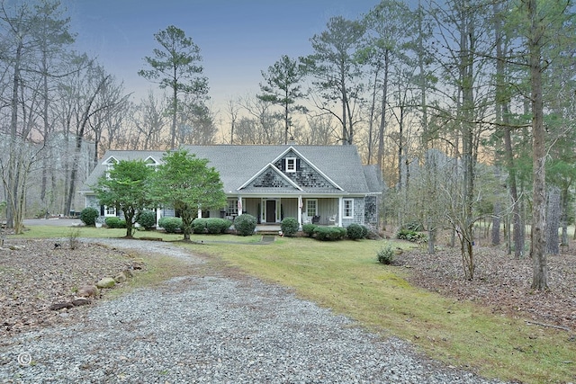 view of front of property with a lawn