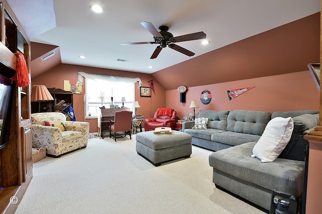 carpeted living room featuring ceiling fan and vaulted ceiling