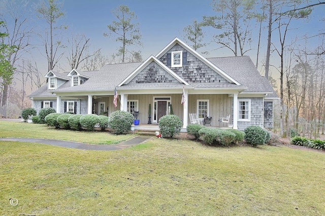 view of front facade with a porch and a front yard