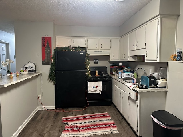 kitchen with sink, dark hardwood / wood-style flooring, a textured ceiling, white cabinets, and black appliances