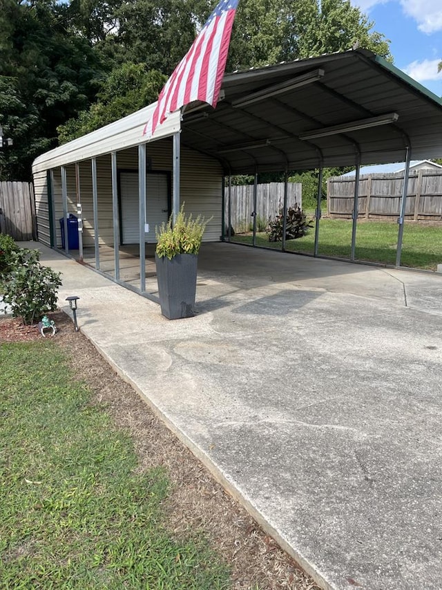 view of car parking featuring a carport