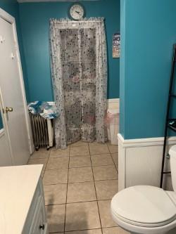 bathroom with tile patterned floors, vanity, and toilet