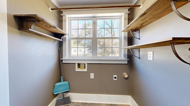 washroom featuring hookup for a washing machine, baseboards, laundry area, and electric dryer hookup