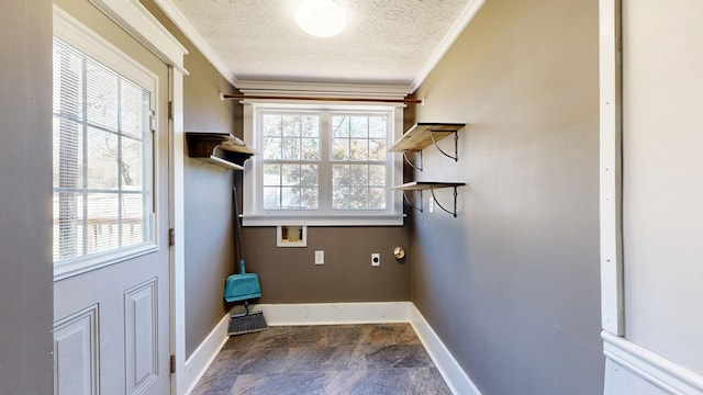 laundry room with washer hookup, crown molding, hookup for an electric dryer, a textured ceiling, and laundry area