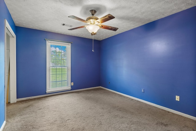 3925 Chris Dr, Columbus, GA 31909 - spare room featuring ceiling fan, a textured ceiling, carpet floors, and baseboards