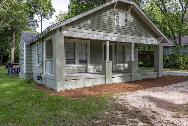 5855 Morningside Dr, Columbus, GA 31909 - bungalow-style house featuring a porch and a front lawn