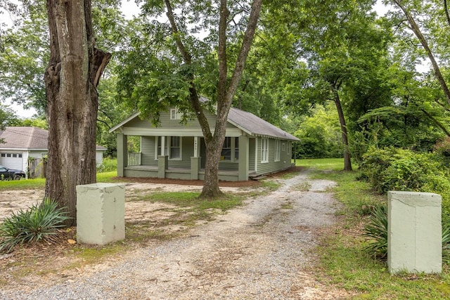 5855 Morningside Dr, Columbus, GA 31909 - bungalow with a porch and dirt driveway
