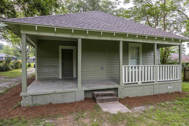 5855 Morningside Dr, Columbus, GA 31909 - property entrance featuring a porch and roof with shingles