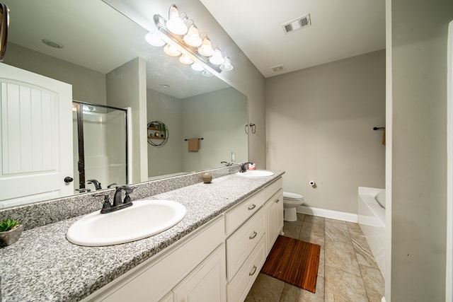 402 Lee Road 2203, Phenix City, AL 36870 - full bath with double vanity, a shower with door, stone tile flooring, and a tub to relax in