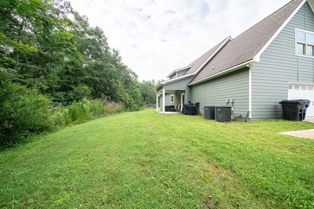 402 Lee Road 2203, Phenix City, AL 36870 - view of green lawn with a garage
