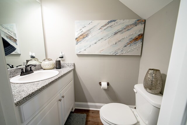 402 Lee Road 2203, Phenix City, AL 36870 - half bath featuring vanity and wood finished floors