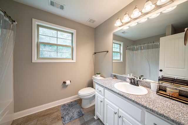 402 Lee Road 2203, Phenix City, AL 36870 - full bathroom featuring vanity, curtained shower, and tile patterned floors