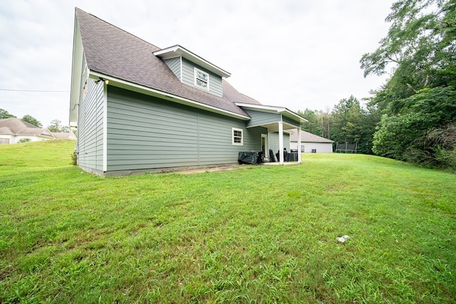 402 Lee Road 2203, Phenix City, AL 36870 - back of house featuring a yard and a shingled roof