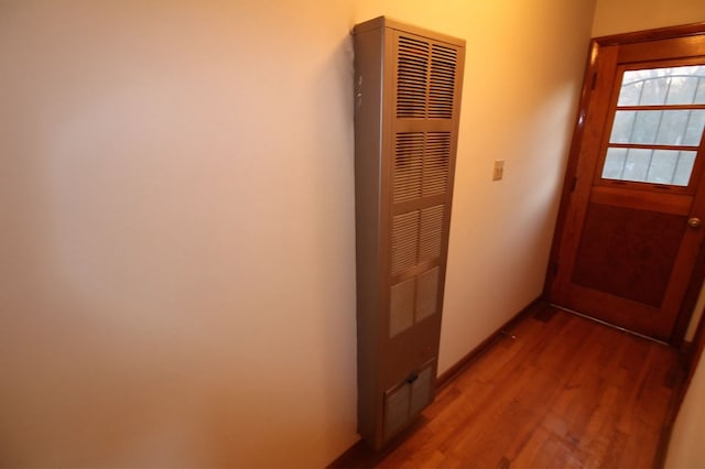 hallway featuring hardwood / wood-style flooring