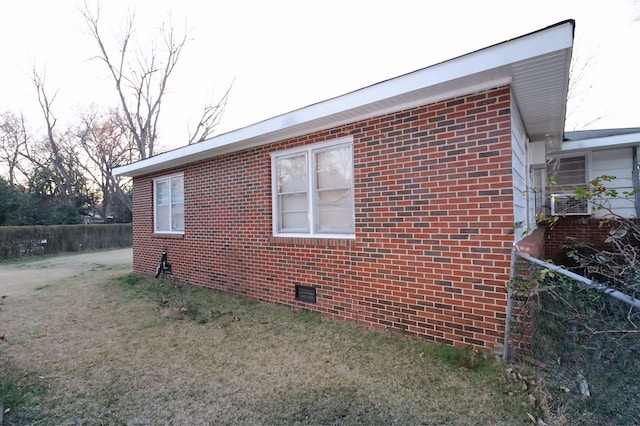 view of home's exterior featuring a lawn