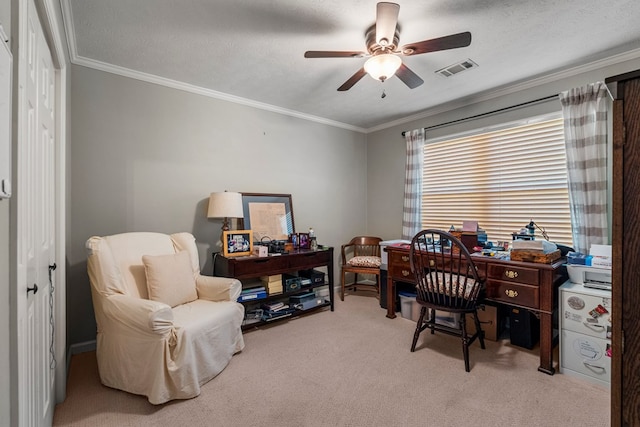 home office featuring ceiling fan, carpet, and ornamental molding