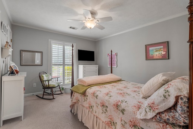 bedroom with light colored carpet, ornamental molding, baseboards, and a ceiling fan