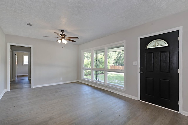 3122 Glenwood Dr, Columbus, GA 31906 - entryway featuring healthy amount of natural light, wood finished floors, a ceiling fan, and a textured ceiling