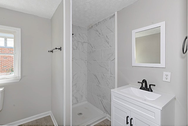 3122 Glenwood Dr, Columbus, GA 31906 - full bathroom with a textured ceiling, a shower stall, and vanity