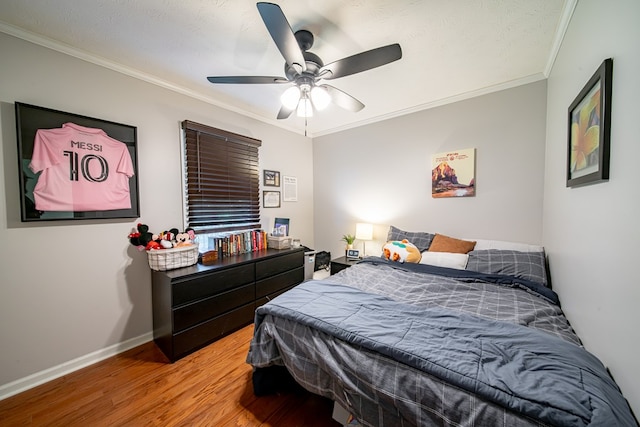 5728 Lexington Dr, Columbus, GA 31907 - bedroom with wood finished floors, ornamental molding, and ceiling fan