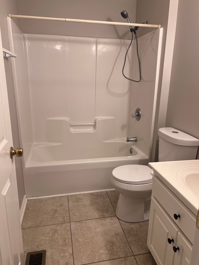 full bathroom featuring shower / bathing tub combination, vanity, toilet, and tile patterned floors