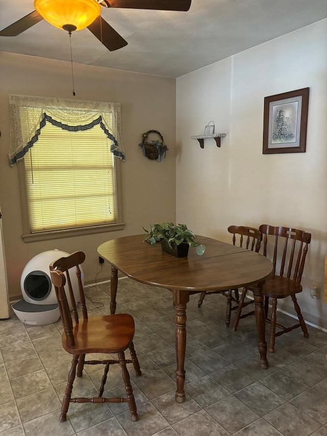 dining area featuring ceiling fan