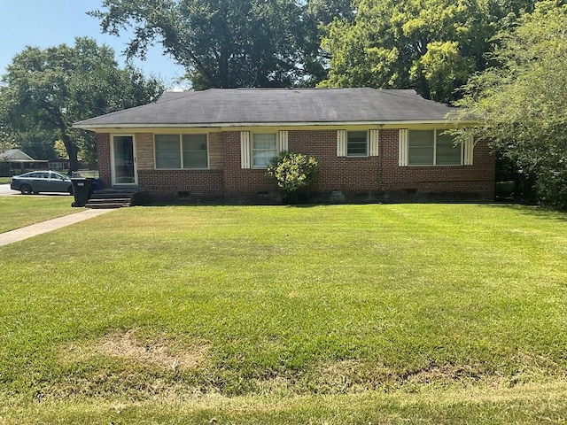 ranch-style home with a front yard