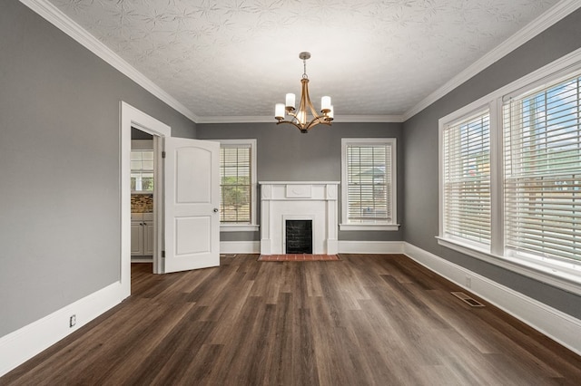 unfurnished living room featuring a fireplace with flush hearth, visible vents, dark wood finished floors, and a chandelier