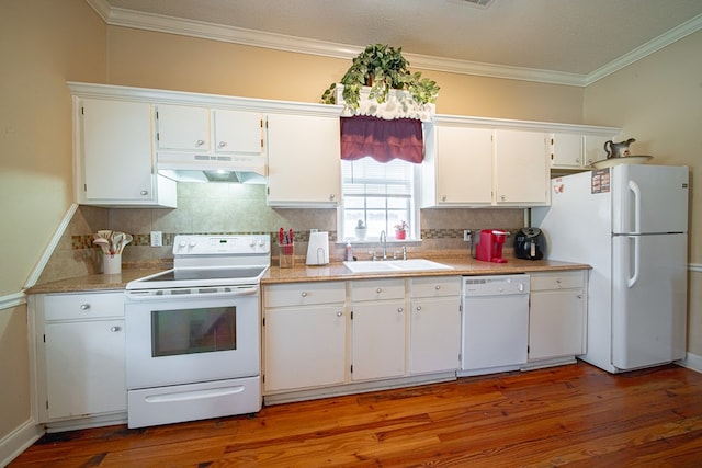 kitchen featuring a sink, light wood finished floors, under cabinet range hood, white appliances, and white cabinetry