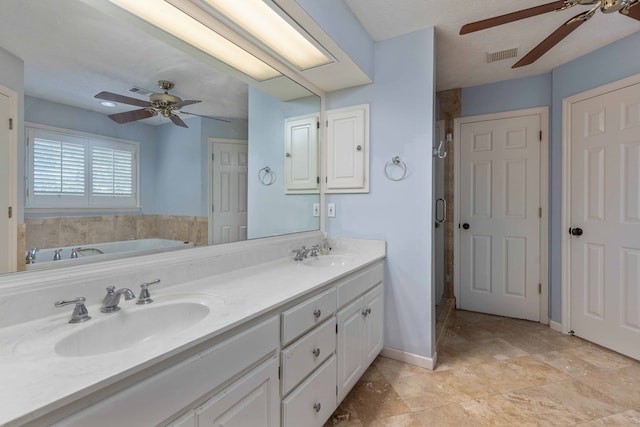 767 River Oaks Ct, Columbus, GA 31904 - full bath featuring a ceiling fan, a stall shower, double vanity, and a garden tub