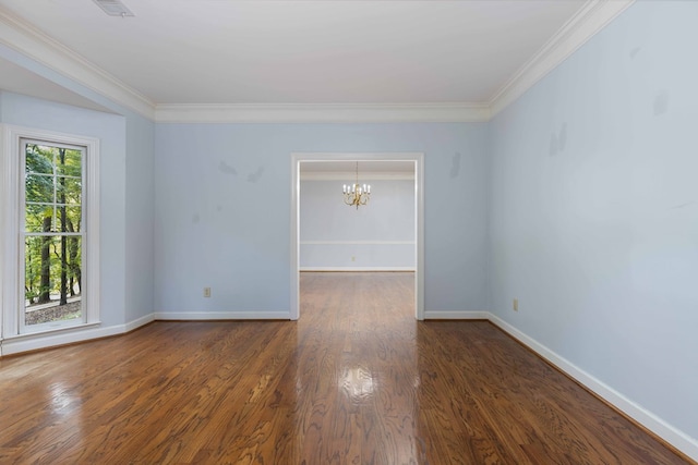 767 River Oaks Ct, Columbus, GA 31904 - unfurnished room with a chandelier, ornamental molding, and wood finished floors
