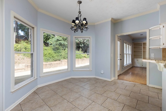 767 River Oaks Ct, Columbus, GA 31904 - unfurnished dining area with light tile patterned floors, healthy amount of natural light, crown molding, and a chandelier