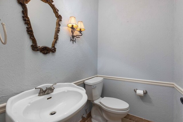 767 River Oaks Ct, Columbus, GA 31904 - half bathroom with a sink and toilet