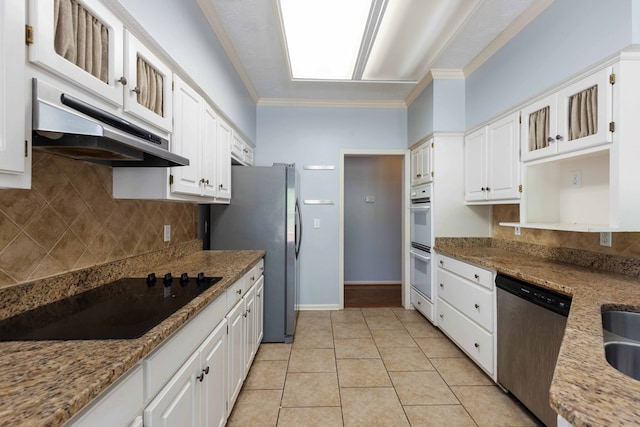 767 River Oaks Ct, Columbus, GA 31904 - kitchen with stainless steel appliances, under cabinet range hood, ornamental molding, white cabinetry, and tasteful backsplash