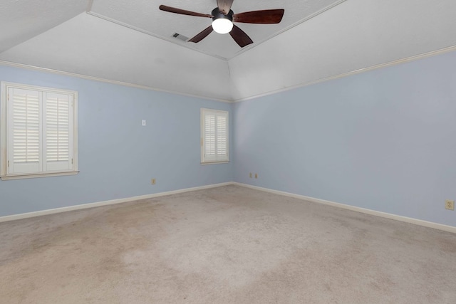 767 River Oaks Ct, Columbus, GA 31904 - empty room featuring a ceiling fan, carpet floors, a raised ceiling, and vaulted ceiling