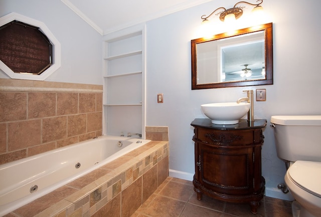 5622 Pollman St, Columbus, GA 31907 - bathroom with a tub with jets, vanity, crown molding, ceiling fan, and tile patterned flooring