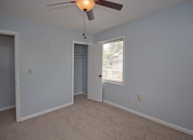 5622 Pollman St, Columbus, GA 31907 - unfurnished bedroom with light colored carpet, a closet, and a ceiling fan