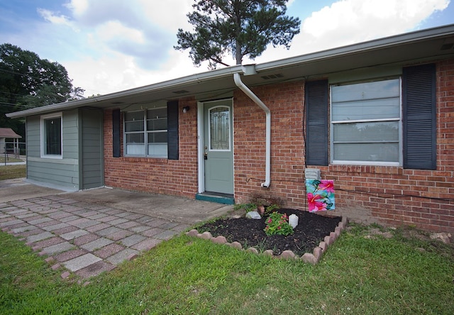 5622 Pollman St, Columbus, GA 31907 - doorway to property with brick siding