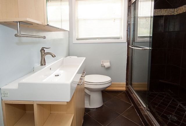 5622 Pollman St, Columbus, GA 31907 - full bath featuring a stall shower, plenty of natural light, tile patterned floors, and vanity