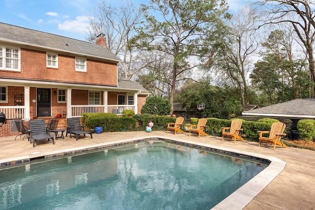 outdoor pool with a patio